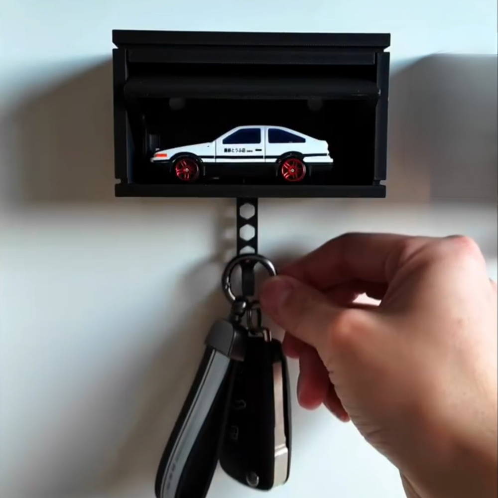 Muur sleutelhanger in de vorm van een garage