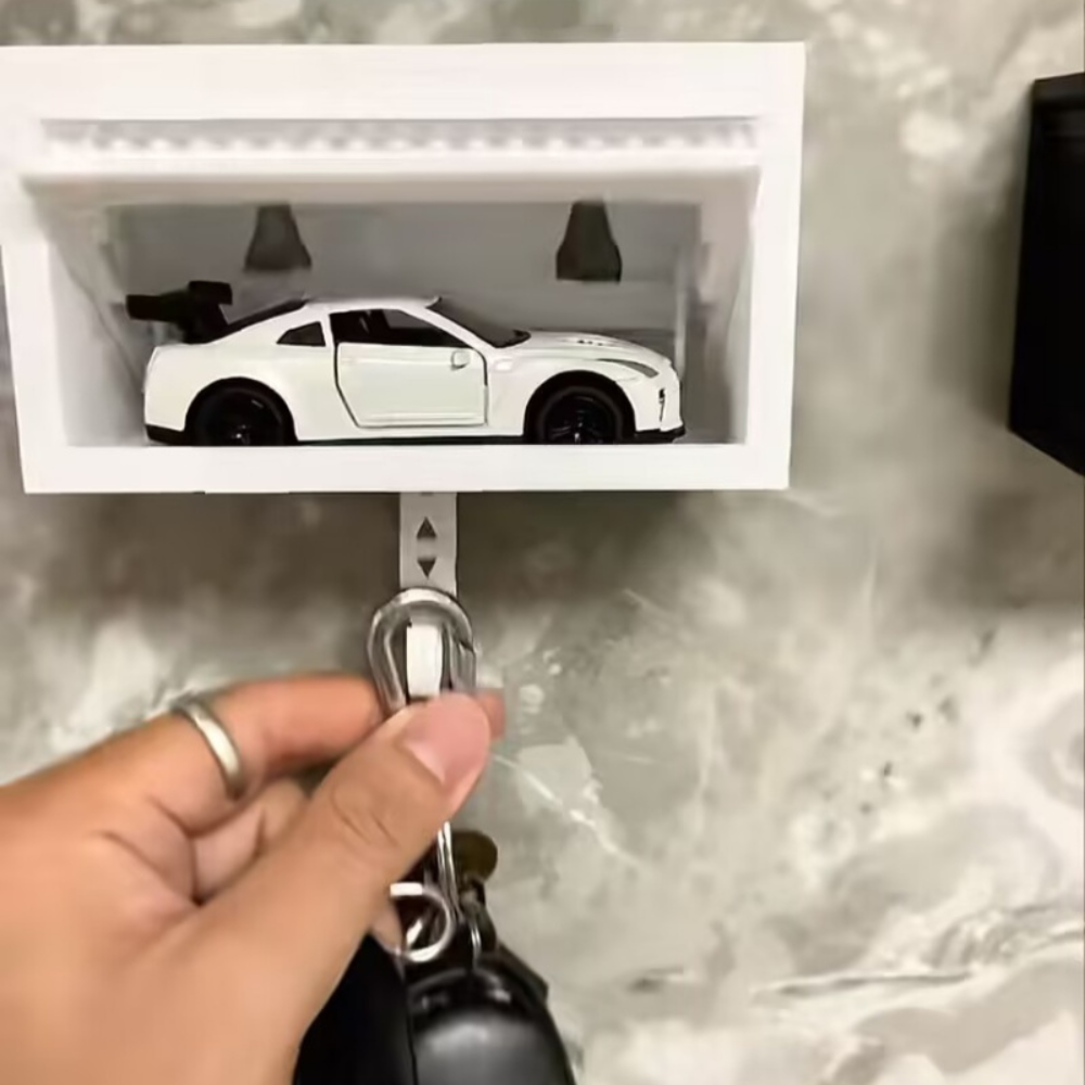 Muur sleutelhanger in de vorm van een garage